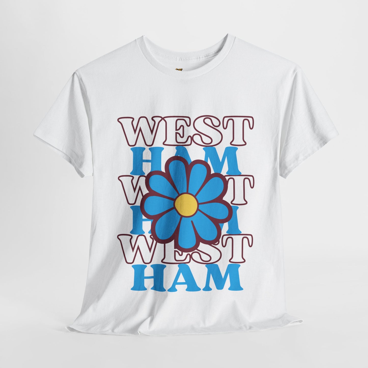 White t-shirt with 'West Ham' text and a blue flower graphic on a white background