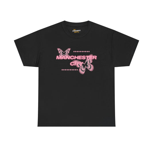 Black t-shirt with pink butterfly design and 'Manchester City' text on a white background