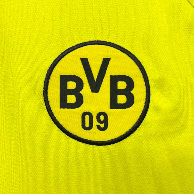 BVB logo on a Dortmund 95/96 home shirt