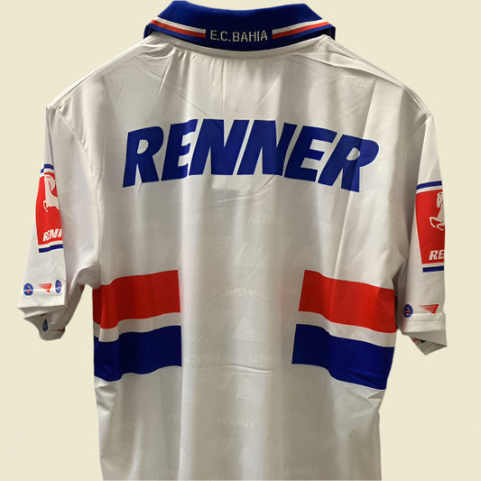 White Bahia 96 home shirt with blue and red accents on a gray background