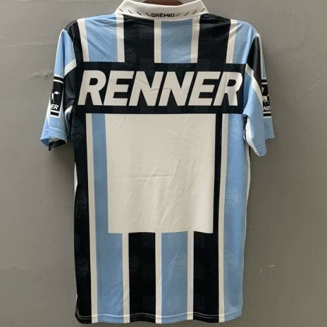 Striped Gremio 1997 home shirt with 'Renner' logo on a gray background