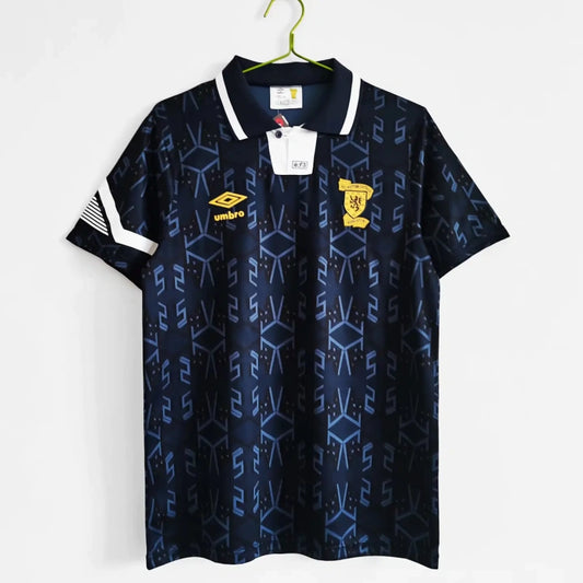 Navy blue Scotland 1992 home shirt with pattern and Umbro logo on a white background