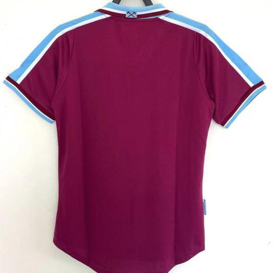 Maroon West Ham 99/01 home shirt with blue and white trim on a hanger against a white background