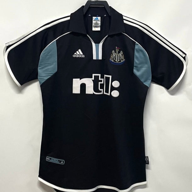 Black Newcastle 00/01 away shirt with Adidas and NTL logos on a white background