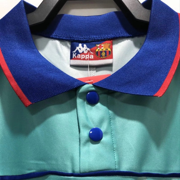Teal Barcelona 92-95 away shirt with blue collar and buttons, featuring Kappa and Barca logos.