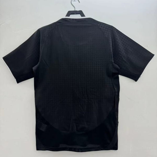 Black man United 03/04 away shirt on a hanger against a white background