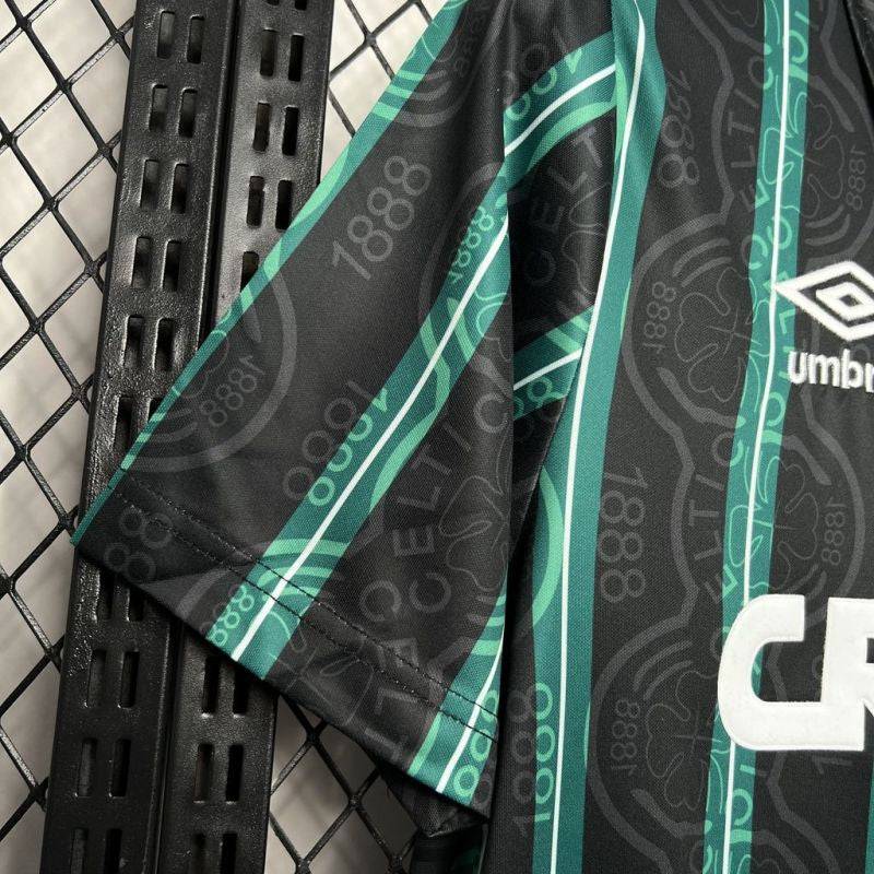 Black Celtic 92/93 away shirt with green and white accents on a textured surface