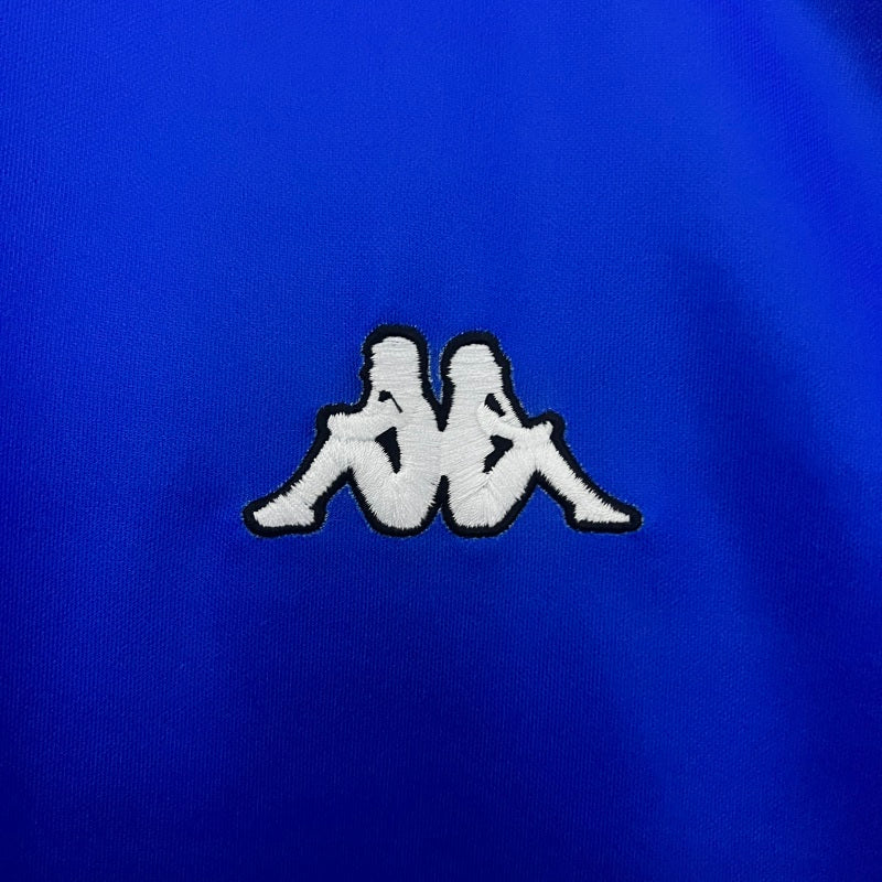 White logo on a blue Juventus 99/00 away shirt
