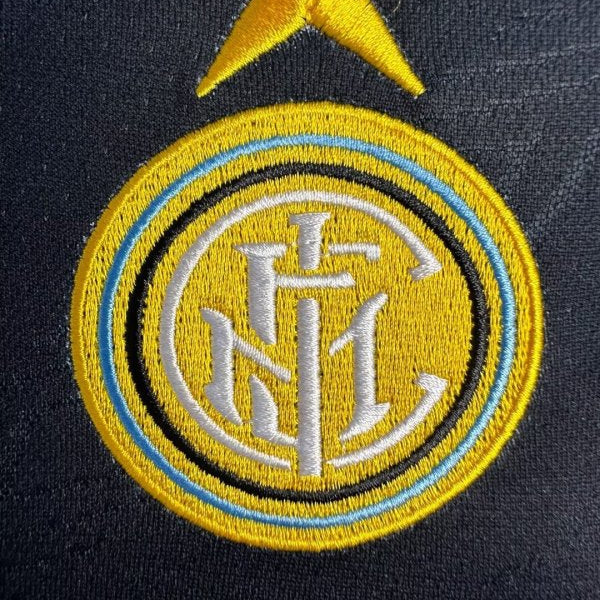 Embroidered Inter Milan logo on a Inter Milan 95/96 home shirt