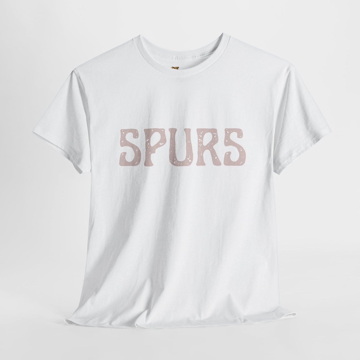 White t-shirt with 'SPURS' printed on it against a light gray background