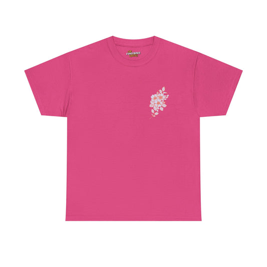 Pink t-shirt with a small floral design on the chest against a white background