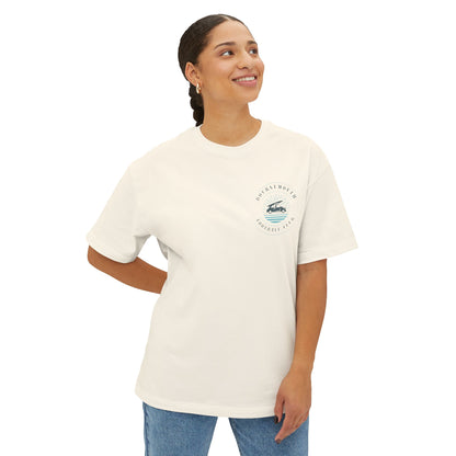 Woman wearing a cream t-shirt with a logo on a white background