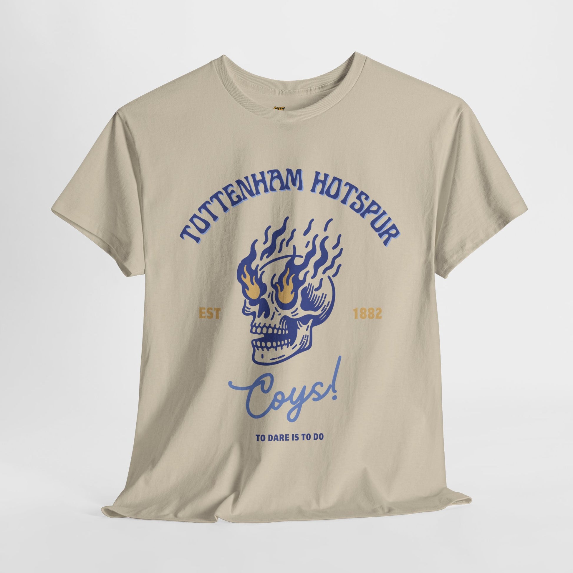 Beige tottenham hotspur t-shirt with blue skull design and text on a white background