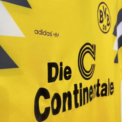 Yellow 1988 Borussia Dortmund dfb-pokal final football shirt with Adidas and Continental logos on a yellow background