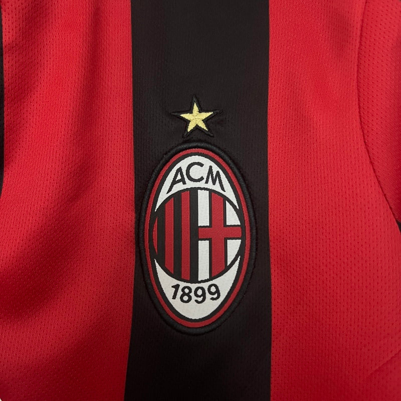 AC Milan logo on a red and black Ac Milan 04/04 home football shirt