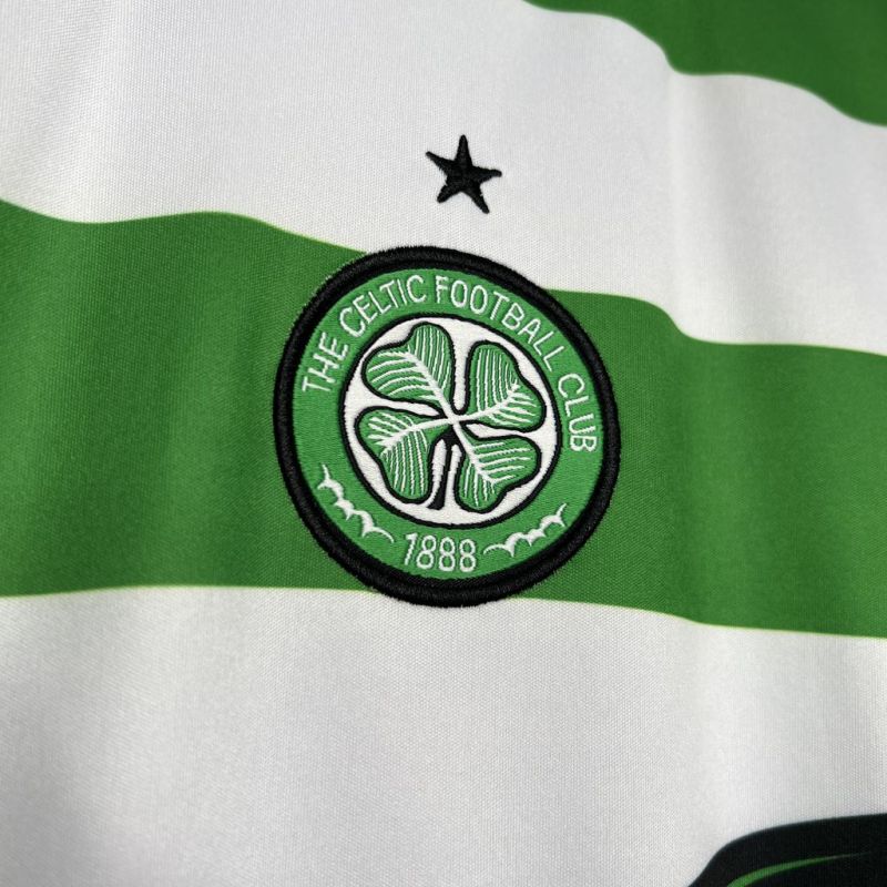 Celtic Football Club logo on a green and white striped Celtic 05/06 home shirt