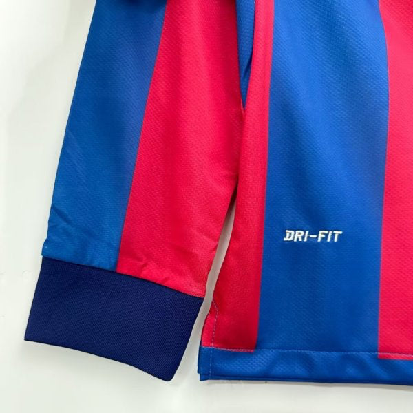 Close-up of a blue and red Barcelona 10/11 home with 'Dri-FIT' branding on a white background
