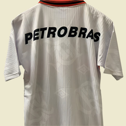 White 1997 Flamengo away shirt with 'PETROBRAS' text on a gray background