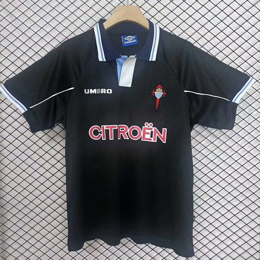 Black Celta Vigo 97/98 away shirt with Citroén branding on a checkered background