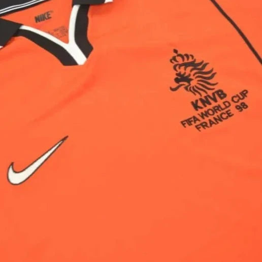 Orange Netherlands 98 World Cup home shirt with Nike logo and KNVB branding on a blue background