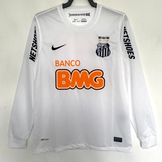 White Santos 11/12 long sleeve home shirt with visible branding on a hanger against a white background