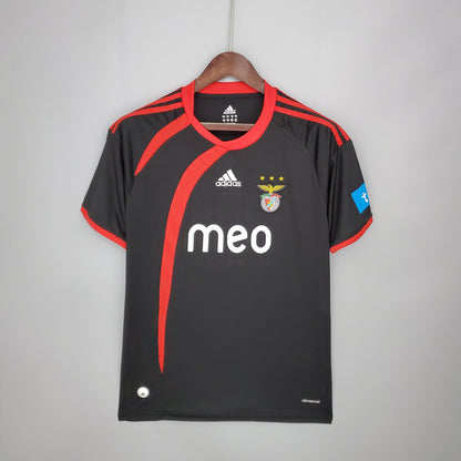 Black Benfica 09/10 away shirt with red accents and visible branding on a gray background