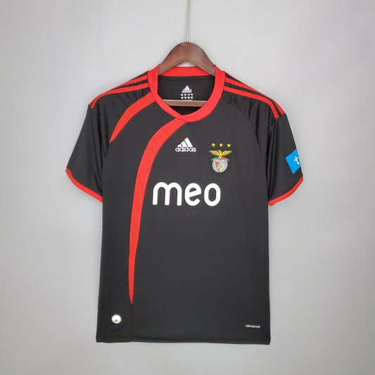 Black Benfica 09/10 away shirt with red accents and visible branding on a gray background