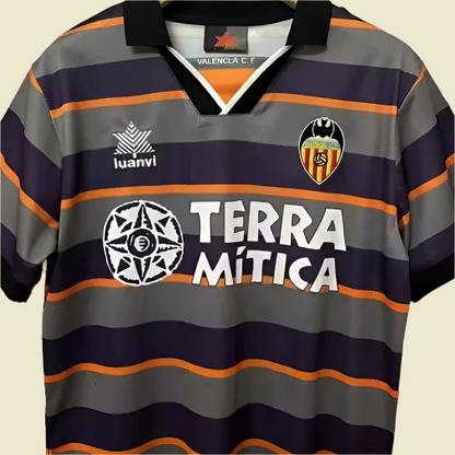 Striped Valencia 99/00 third shirt with branding on a gray background