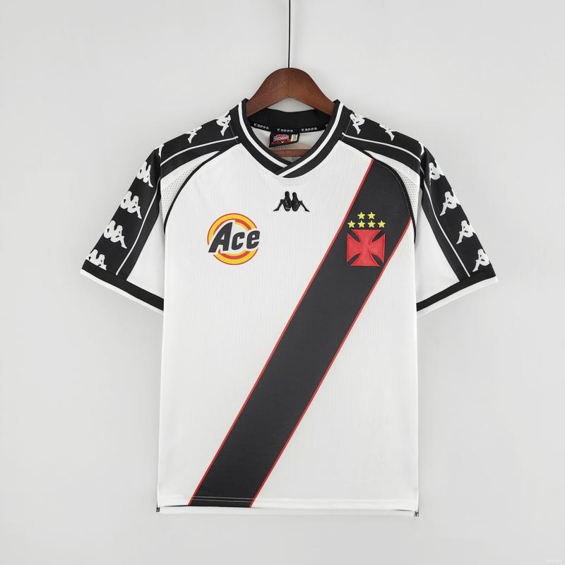 White Vasco de gama 2000 away shirt with black and red accents on a hanger against a white background
