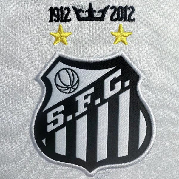 Embroidered logo with 'S.E.C.' and years 1912-2012 on a santos 2012 home shirt
