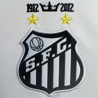 Embroidered logo with 'S.E.C.' and years 1912-2012 on a santos 2012 home shirt