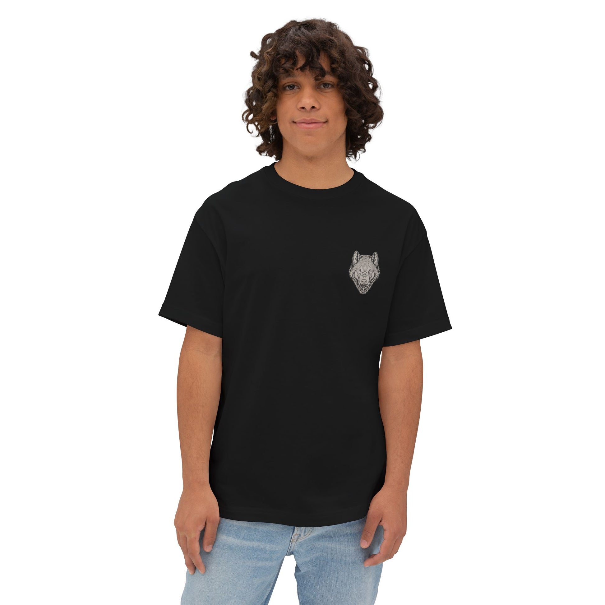 Person wearing a black t-shirt with a wolf logo on a white background