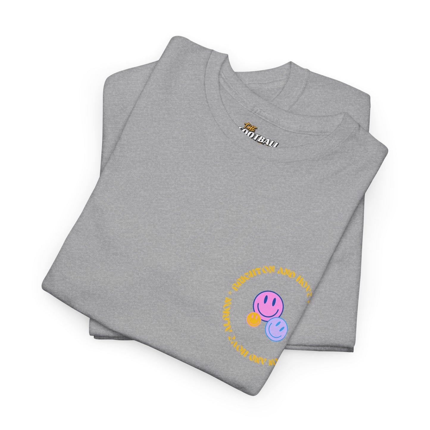 Folded gray t-shirt with colorful smiley face design and text on a white background
