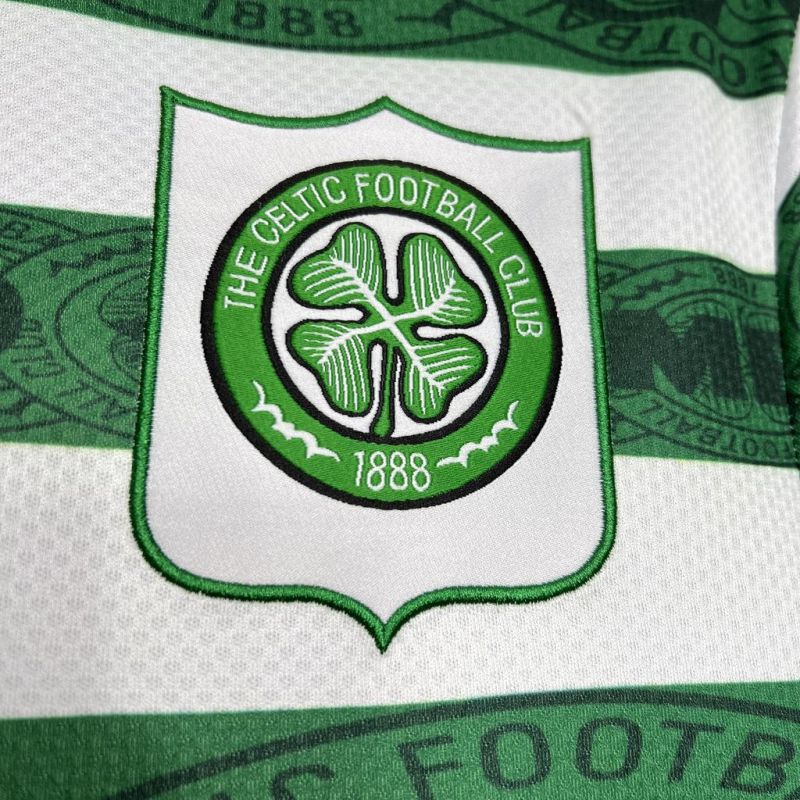 Celtic Football Club logo on a Celtic 95-97 home shirt with green and white colors.