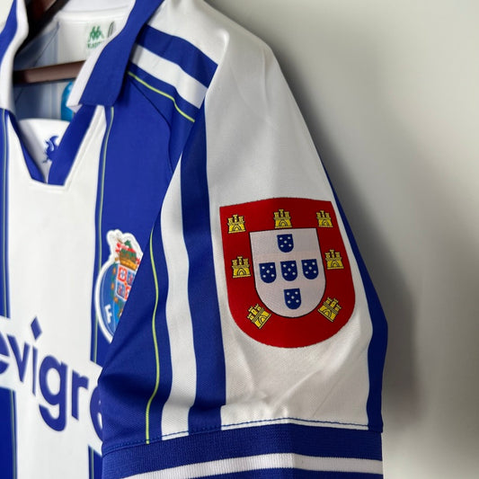 Portuguese Porto 98/99 home shirt with emblem on a gray background