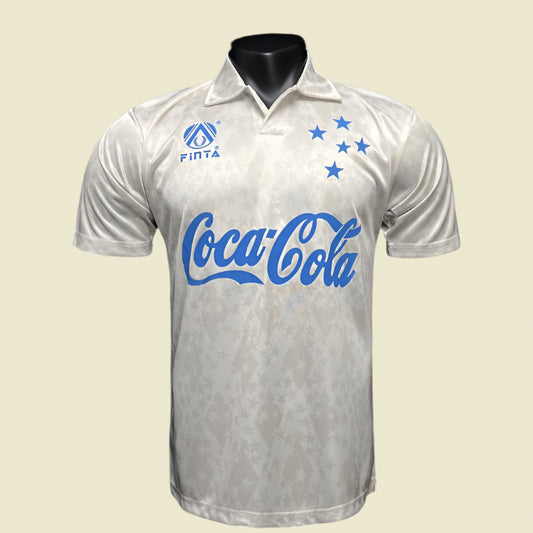 White cruzeiro 1993 away shirt with blue branding on a black background