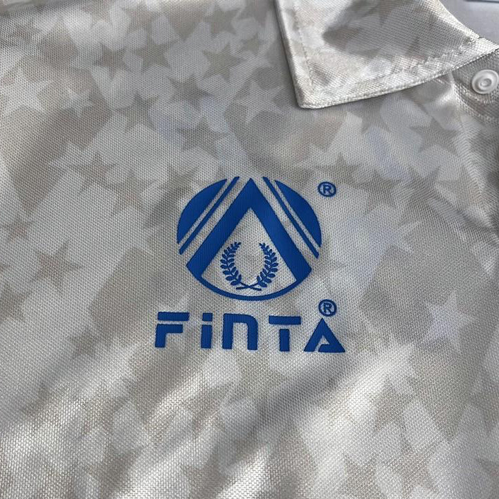 Close-up of a cruzeiro 1993 away shirt with Finta logo