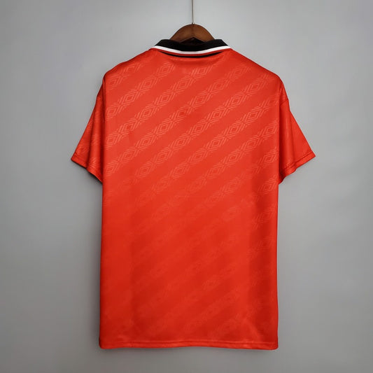 Red Nottingham forest 95/96 home shirt with black and white pattern on a gray background