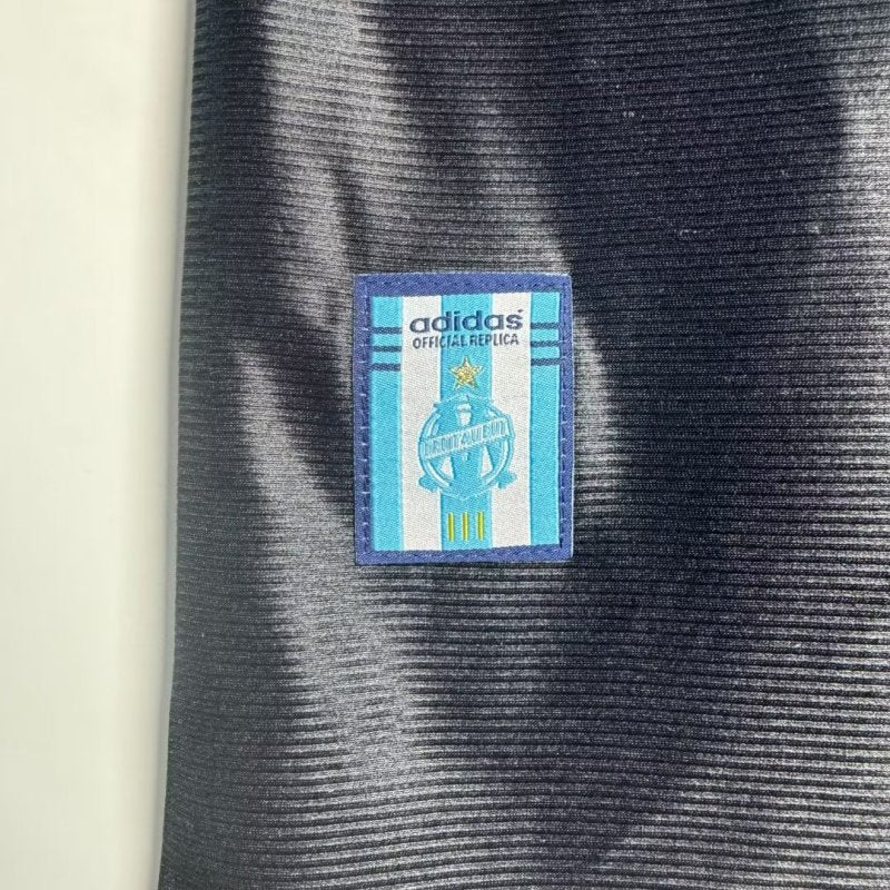 Close-up of an Adidas label on a Marseille 99/00 third shirt