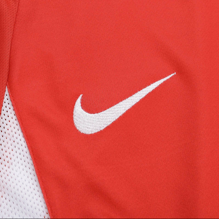 Red South Korea 2002 home shirt with a white Nike logo