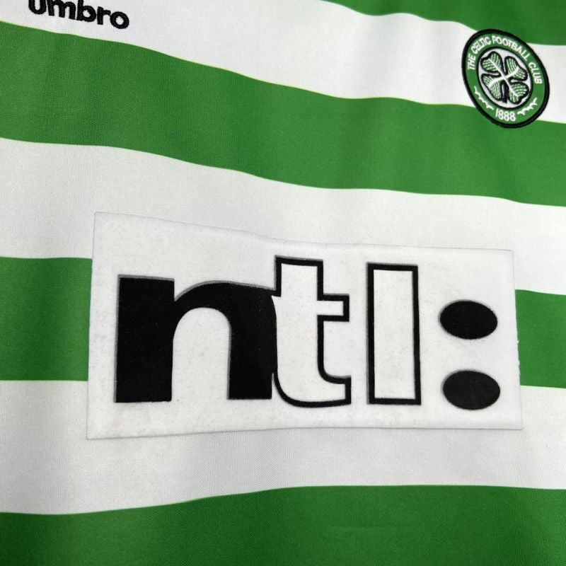 Green and white striped 99/00 Celtic home shirt with NTL logo and club emblem.