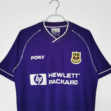 Purple Tottenham 98/99 away shirt with Pony and Hewlett Packard logos on a white background