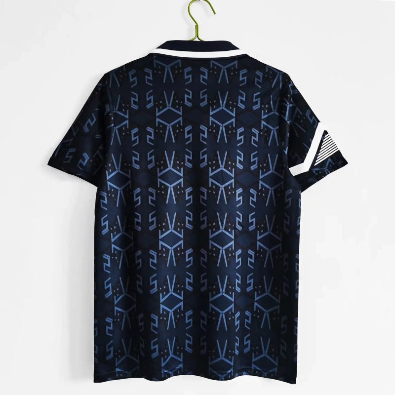 Navy blue Scotland 1992 home shirt with geometric pattern on a white background