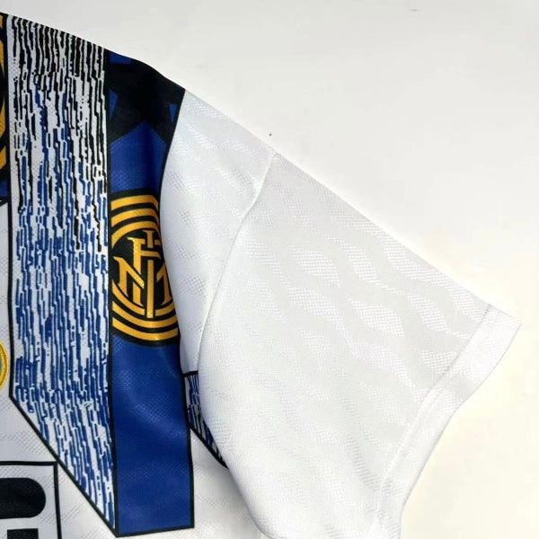 Close-up of a Inter Milan 95/96 away shirt with a brand logo on a white background