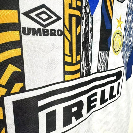 Close-up of a Inter Milan 95/96 away shirt with Umbro and Pirelli logos.