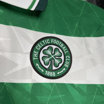 Close-up of The Celtic Football Club logo on a green and white Celtic 89-91 home shirt 