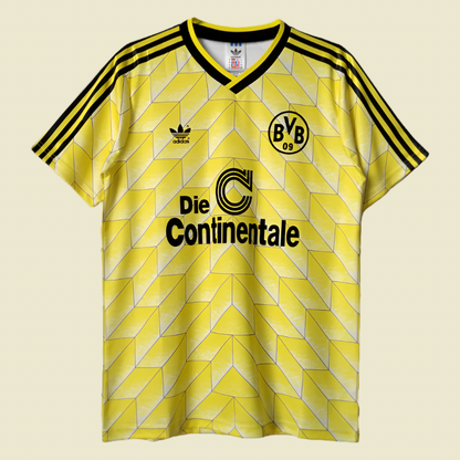 Yellow Dortmund 88/89 home shirt  with Adidas and Borussia Dortmund logos on a white background