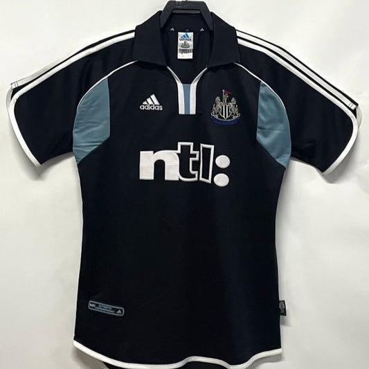 Black Newcastle 00/01 away shirt with Adidas and NTL logos on a white background