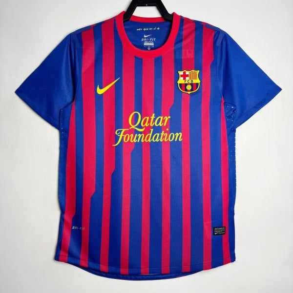 Blue and red striped Barcelona 11/12 home shirt with Nike logo on a white background