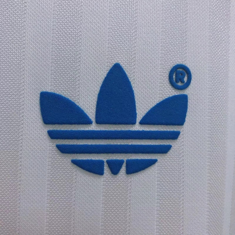 Blue Adidas logo on a white Marseille 90/91 home shirt